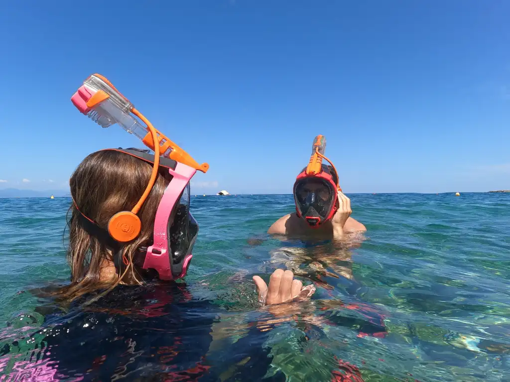 Girl and boy in Noli with Aria Full Face Snorkeling Mask