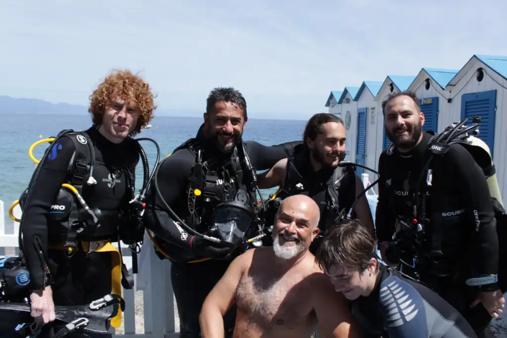 Divers happy together after visiting Nemo's Garden